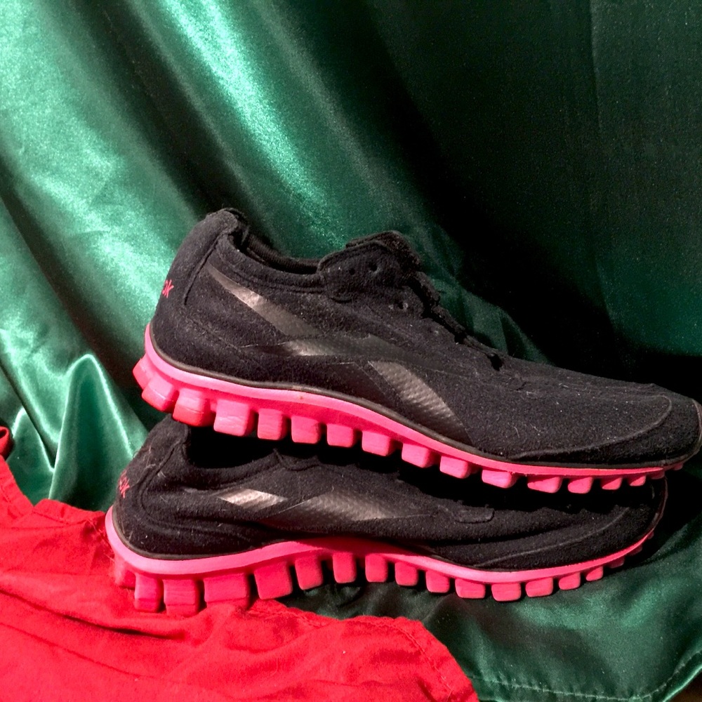 Pink and black Reebok’s